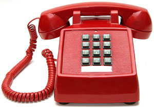 red touch-tone phone, for efficiently dialing telephone numbers