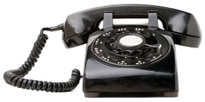 vintage rotary-dial telephone, capable of dialing phone numbers with area codes